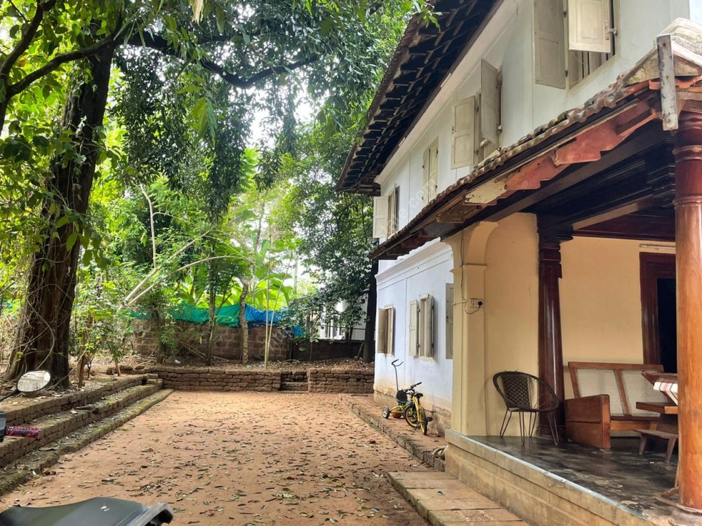 Ancestral Two Storey Tiled Building with Nadu Muttom for sale at