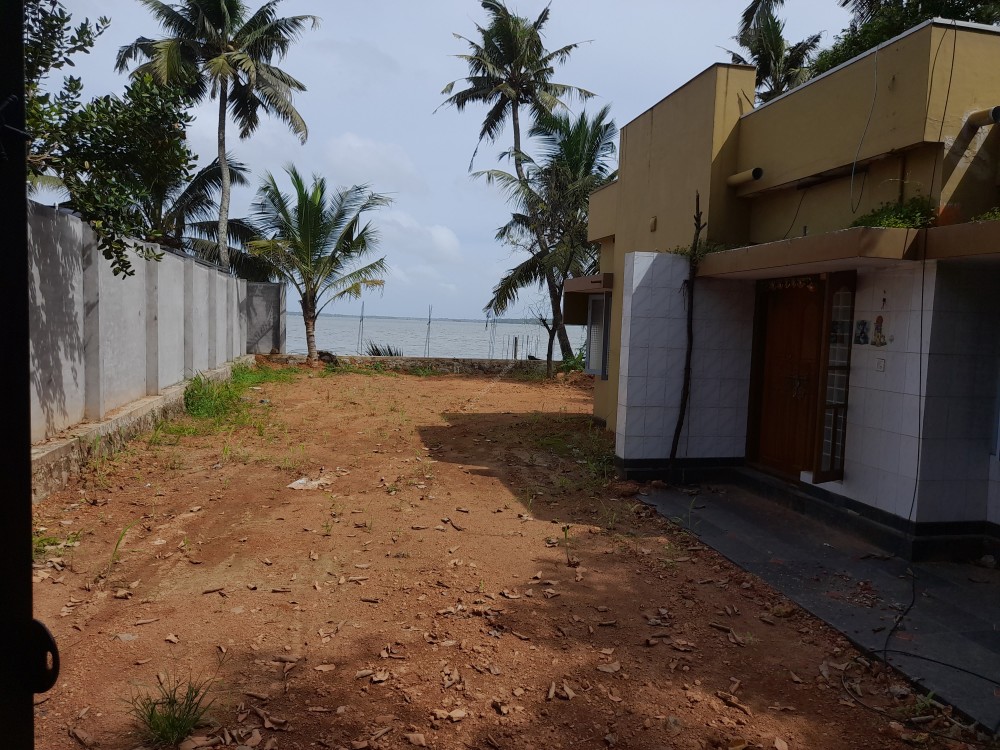 15 CENTS OF LAKE SIDE LAND WITH OLD HOUSE FOR SALE AT PANANGAD
