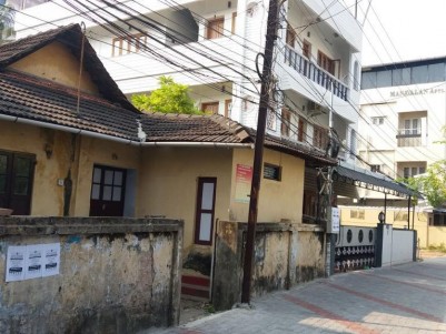 5.6 Cents of Commercial Land with Old House for sale Near Banerji Road, Ernakualm